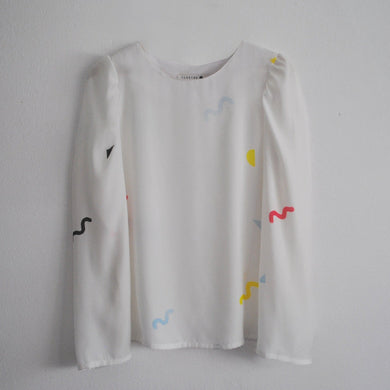 blusa blanca bauhaus